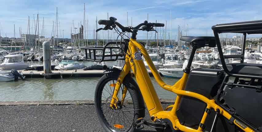 vélo cargo Momentum d'occasion sur le port de Royan